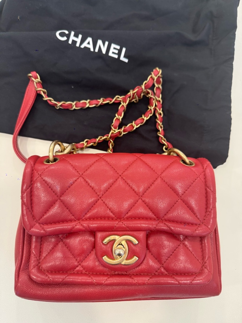 CHANEL Red Quilted Mini Flap Crossbody with Gold Hardware